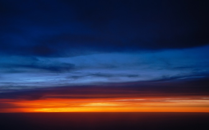 High-resolution desktop wallpaper Sunset Over the Clouds by altmann